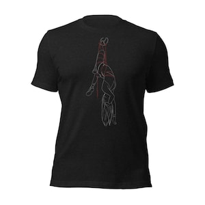 May include: A black t-shirt with a white line drawing of a person tied up with red string.