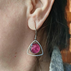 Stainless steel earrings with real pink bougainvillea petals encapsulated in UV resin, elegant and unique triangular handmade design.