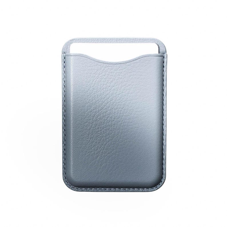 May include: A light blue leather phone case with a handle at the top. The case has a textured surface and a curved top edge. The stitching is visible around the edges of the case.