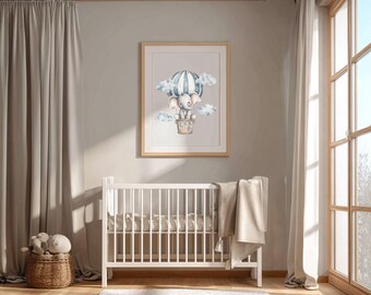 May include: A framed watercolor print of a baby elephant in a hot air balloon with blue and white stripes. The nursery decor also includes a white crib, a woven basket with stuffed animals, and a beige blanket.