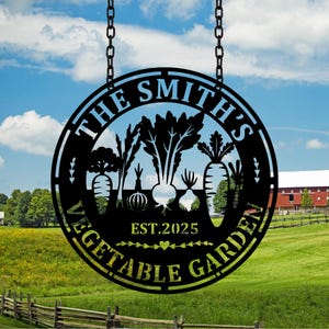 May include: Black metal sign with the text "The Smith's Vegetable Garden Est. 2025" and a silhouette of various vegetables.
