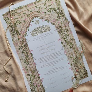 May include: A rectangular marriage certificate featuring an illustration of a stone archway adorned with green vines and pink flowers. The document includes black printed text, Arabic calligraphy, and signature lines, accented by a string of white pearls.