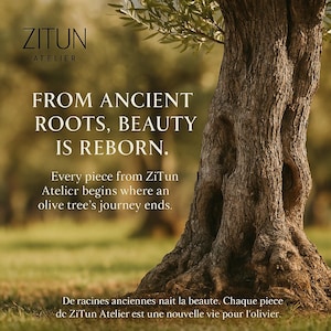 May include: Image featuring a close-up of a weathered olive tree trunk with text overlay. The text reads "FROM ANCIENT ROOTS, BEAUTY IS REBORN." and "Every piece from ZiTun Atelier begins where an olive tree's journey ends."