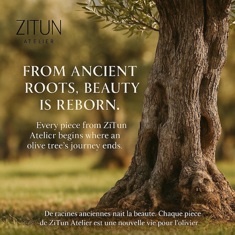 May include: Image featuring a close-up of a weathered olive tree trunk with text overlay. The text reads "FROM ANCIENT ROOTS, BEAUTY IS REBORN." and "Every piece from ZiTun Atelier begins where an olive tree's journey ends."