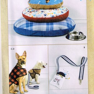 May include: A sewing pattern for dog coats and accessories. The pattern includes instructions for making a dog bed, a dog coat, and a dog leash. The pattern is from Kwik Sew and has the number K4285.