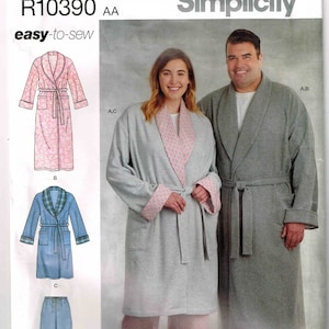 May include: Simplicity sewing pattern R10390 AA easy-to-sew for a robe with a shawl collar and a tie belt. The pattern includes three views: a pink robe with a floral print, a blue robe with a plaid trim, and a gray robe with a pink and white patterned trim. The pattern also includes a pair of pants.