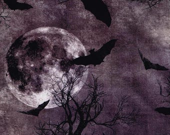 May include: A digitally created image featuring a full moon in a dark purple sky. Silhouetted bats fly across the scene, with bare tree branches in the foreground. The overall theme is a spooky, Halloween-inspired design.