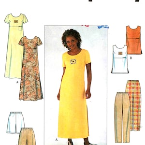 May include: Simplicity sewing pattern featuring a woman in a yellow dress with a sunflower detail. The pattern includes options for dresses, tops, shorts, and pants. The Simplicity logo is displayed at the top.