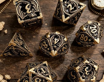 May include: A set of seven polyhedral dice crafted from antique gold-toned metal, each featuring intricate dragon motifs and raised numerals. The collection includes a d4, d6, d8, d10, d12, d20, and a percentile die, all displaying a dark, recessed finish.