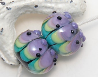 Purple and Green Petals with Black Dots Lampwork Glass Bead Pair