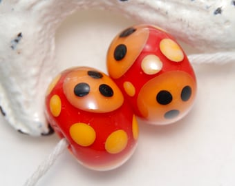 Red Orange Yellow and Black Super Spotty Lampwork Glass Bead Pair