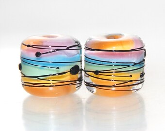 Pastel regenboog zwarte splash Lampwork glazen vat kraal paar