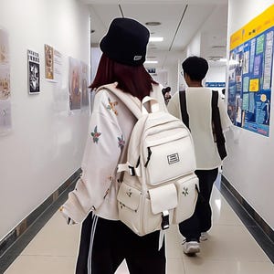 Sac à dos en nylon multi-poches - Cartable unisexe de grande capacité avec fermeture à boucle pour le compartiment pour ordinateur portable, décontracté et durable