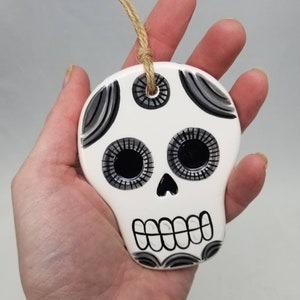 sugar skull ornament / day of the dead / candy skull / folk art / hand painted ornament / halloween decor / ceramic skull / stocking stuffer