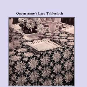 May include: A black and white image of a table set with a Queen Anne's Lace tablecloth. The tablecloth is intricately crocheted with a floral pattern. The table is set with white plates, silverware, and glassware. The text "Queen Anne's Lace Tablecloth" is at the top.