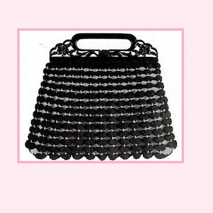 May include: A black crocheted handbag with a decorative handle. The bag is made of a series of small, round crocheted flowers.
