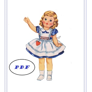 Könnte beinhalten: Ein Vintage-Papierpuppenmuster eines Mädchens in einem blau-weißen Kleid mit einem roten Herzen. Das Muster ist mit "PDF" gekennzeichnet und kann ausgedruckt und ausgeschnitten werden.