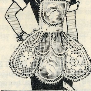 May include: Black and white illustration of a crochet apron with a scalloped edge and floral design. The apron is shown on a woman wearing a dress.