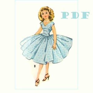 May include: A vintage illustration of a woman wearing a light blue dress with a white polka dot pattern. The dress has a fitted bodice and a full skirt. The woman is wearing black heels and has blonde hair.