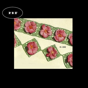 May include: Crocheted floral trim featuring pink flowers with orange centers, set against a green background. The trim is arranged in a repeating pattern. The text "EI-288" is visible.