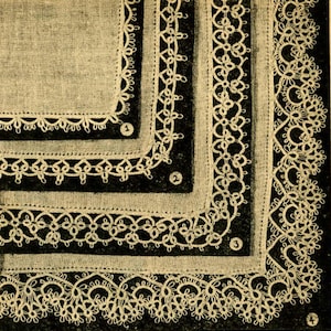 May include: Four different lace edging designs for handkerchiefs. The designs are numbered 1 through 4. The lace is white and the background is black.