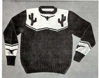 May include: A black and white knitted sweater with a western theme. The sweater features a white yoke with black cactus and steer head designs.