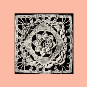 May include: A white crocheted square with a floral design in the center. The square has a border of crocheted lace.