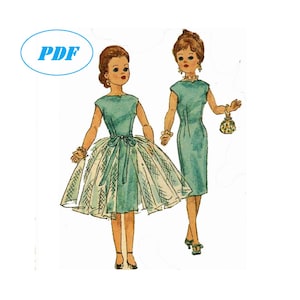 May include: A vintage sewing pattern for two dresses. The dress on the left is a teal blue dress with a full skirt and a matching sash. The dress on the right is a teal blue sheath dress. Both dresses have a scoop neckline.