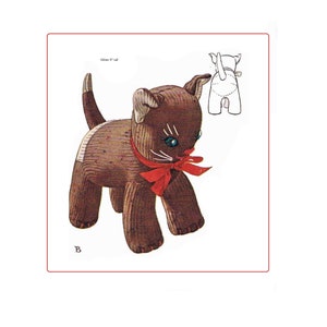 May include: A brown and white stuffed cat toy with a red bow. The cat is 9 inches tall and has blue eyes. The toy is made of fabric and has a stitched-on face.