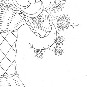 May include: A black and white line drawing of a floral design with a large flower in the center and smaller flowers surrounding it.