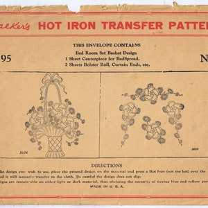 May include: A vintage envelope containing iron-on transfer patterns for a bed room set. The envelope is labeled "Wackers HOT IRON TRANSFER PATTERNS" and "No. 95". The patterns include a basket of flowers and a floral garland.