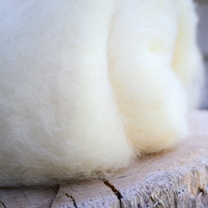 Clean natural wool batting one pound.