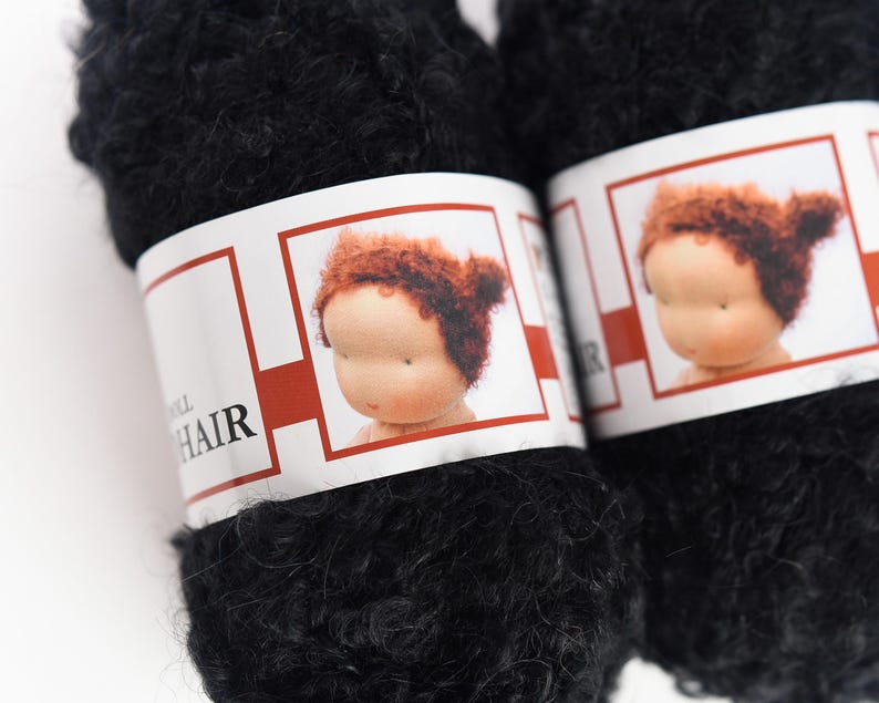 Black boucle mohair doll hair yarn made by De Witte Engel.