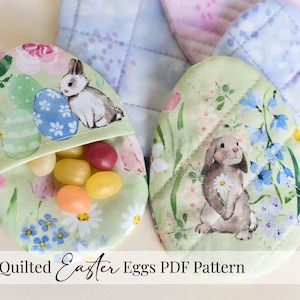 May include: A white ceramic mug with a black handle and the text "But First, Coffee" in a black, bold font. The mug is on a white surface.