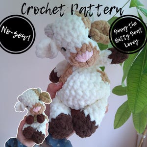 May include: A handmade crochet goat lovey in white, brown, and tan. The plush toy has a pink nose and brown hooves. The image includes the text "Crochet Pattern" and "No-Sew!" in a black circle, and "Ginny the Bitty Goat Lovey" in a black circle.