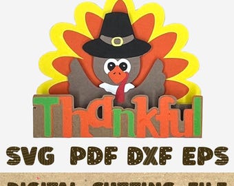 May include: A Thanksgiving-themed digital cutting file featuring a turkey wearing a pilgrim hat. The word "Thankful" is displayed in orange and green letters. The file formats are SVG, PDF, DXF, and EPS.