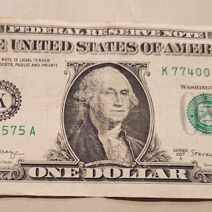 2017A Series Dollar Bill Odometer Gas Pump Bill Serial Number 77400575
