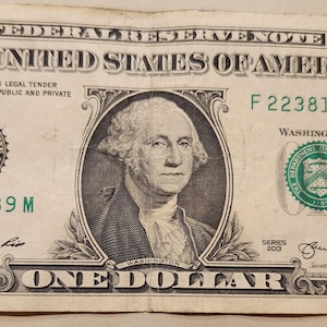 2013 Series Dollar Bill Over Inked Letter &quot;M&quot; Serial Number 22381789