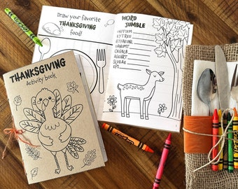 May include: A Thanksgiving activity book with a turkey on the cover, a coloring page with a deer, and a place setting with crayons wrapped in burlap.