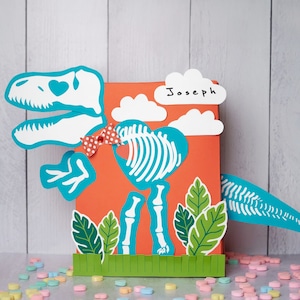 Kit de decoração para impressão T Rex Fossil Valentine Box gravata borboleta 3D, opções de olho, esqueleto de dinossauro caixa de correio de menino para cartões escolares de dia dos namorados
