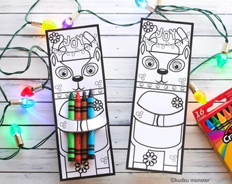 May include: A printable coloring page featuring a reindeer with the word "JOY" above it. The reindeer is wearing a festive garland of lights and has a place to hold crayons or markers.