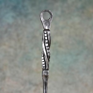 Hand-forged fire poker with cube twist handle and large hanging loop. Fireside tools, handmade by blacksmith