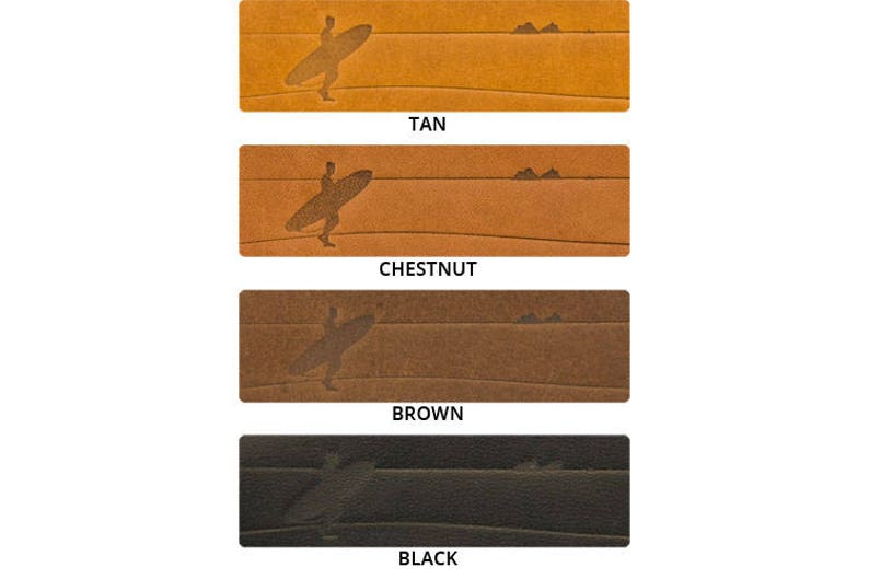 May include: Four leather samples in different colors: tan, chestnut, brown, and black. Each sample features an embossed design of a person surfing.