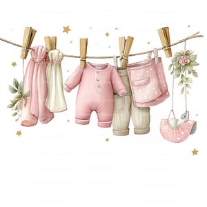 May include: Watercolor illustration of baby clothes hanging on a clothesline. The clothes include a pink onesie, bib, and pants, along with other garments in shades of pink and cream. Wooden clothespins and gold stars complete the design.