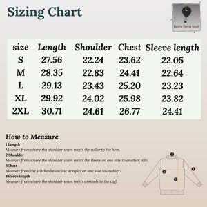 May include: Sizing chart for a garment with measurements in inches for length, shoulder, chest, and sleeve length. Sizes include S, M, L, XL, and 2XL.  A diagram shows how to measure each part of the garment.