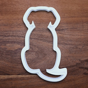 Dog-shaped cookie cutter made from compostable bioplastic, ideal for baking full-sized dog treats, fondant crafts, or clay projects.