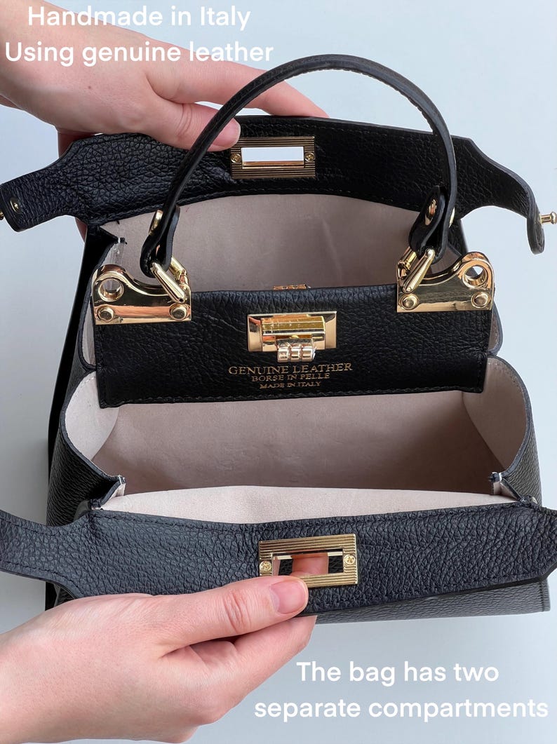 K&ouml;nnte beinhalten: Schwarze Ledertasche mit goldenen Beschl&auml;gen und zwei separaten F&auml;chern. Die Tasche ist ge&ouml;ffnet und das Innere ist mit einem hellbeigen Stoff ausgekleidet. Das Etikett lautet "Echtleder, Borse in Pelle, Hergestellt in Italien."
