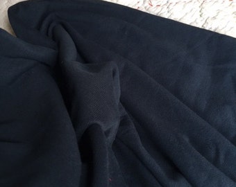 Micro rib knit organic cotton, dyed dark navy blue. Tubular form, 34-35 inches open width. Soft and perfect for apparel and infinity scarves