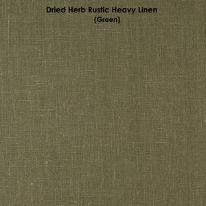 May include: A close-up of a green, textured linen fabric. The fabric has a rustic, heavy feel.