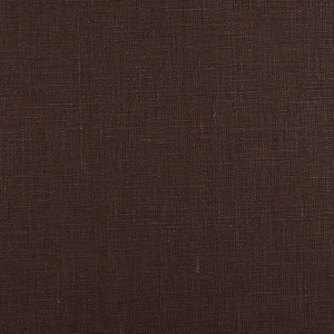 May include: A close-up of a brown fabric with a woven texture.